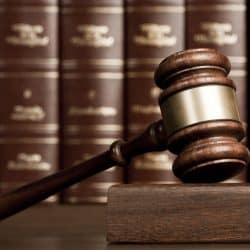 048405613-gavel-wooden-desk-250×250